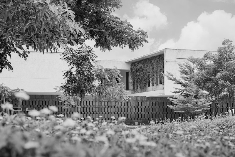 The Northstar School campus building surrounded by trees and gardens