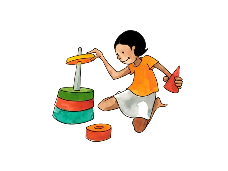A child weighing and arranging colourful blocks